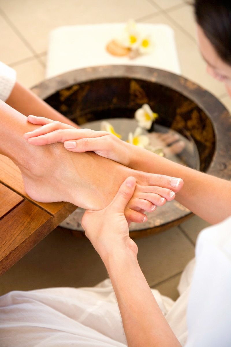 Foot reflexology treatment at a professional wellness spa in Akola, Maharashtra